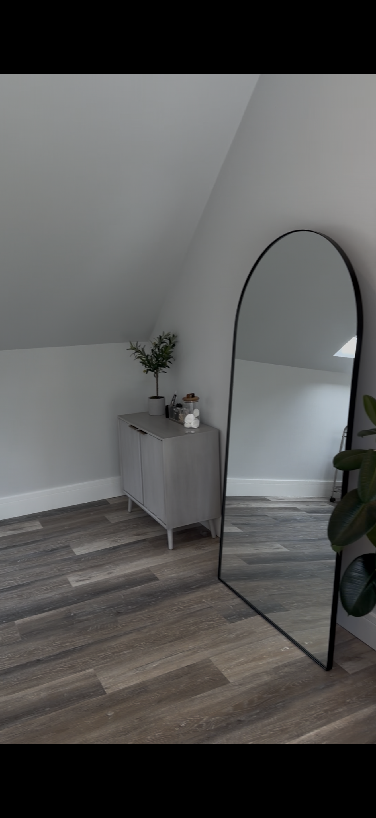 The Aesthetic Space studio with arched mirror and treatment space